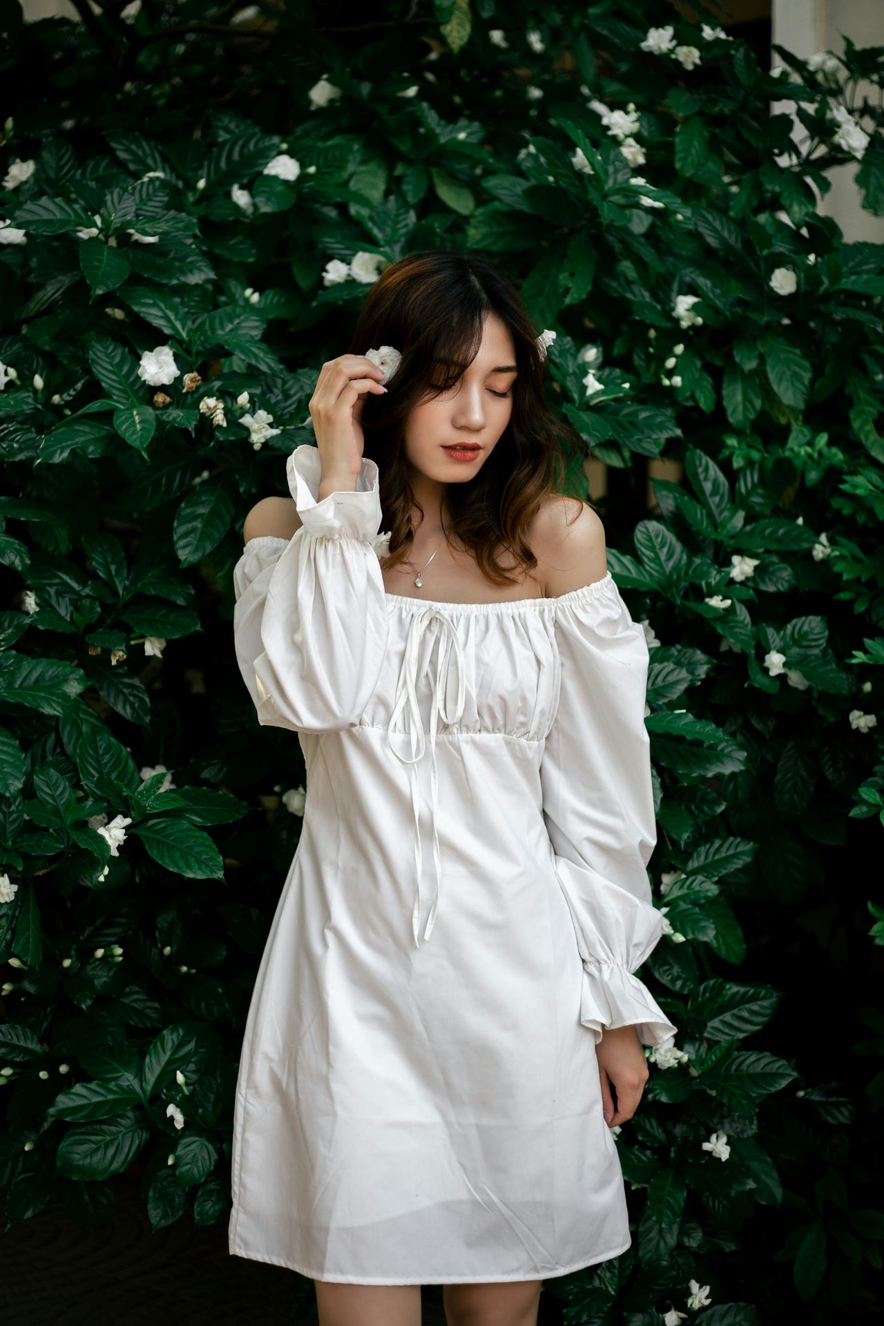 a woman in a white dress